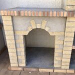 Barbecue de jardin en briques et béton armoire
