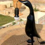 Lampe coureur indien en resine 